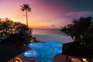 ATMOSPHERE-KANIFUSHI-MALDIVES-VILLAS-KANIFUSHI-RESIDENCE-POOL-VIEW-AT-SUNSET_09_2021-1200x801